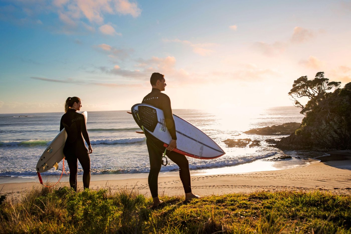 Sunset paddle out from the dunes at Awana, Awana (GBI) surf spot, Auckland / Rodney, New Zealand.
