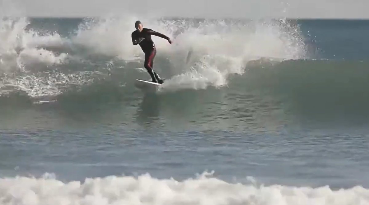 Noseriding a Back Beach peak, Back Beach surf spot, Taranaki / SH45, New Zealand.