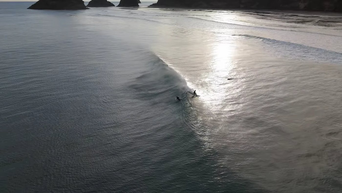 Dawn lines at Back Beach with the Sugar Loaf Islands behind, Back Beach surf spot, Taranaki / SH45, New Zealand.