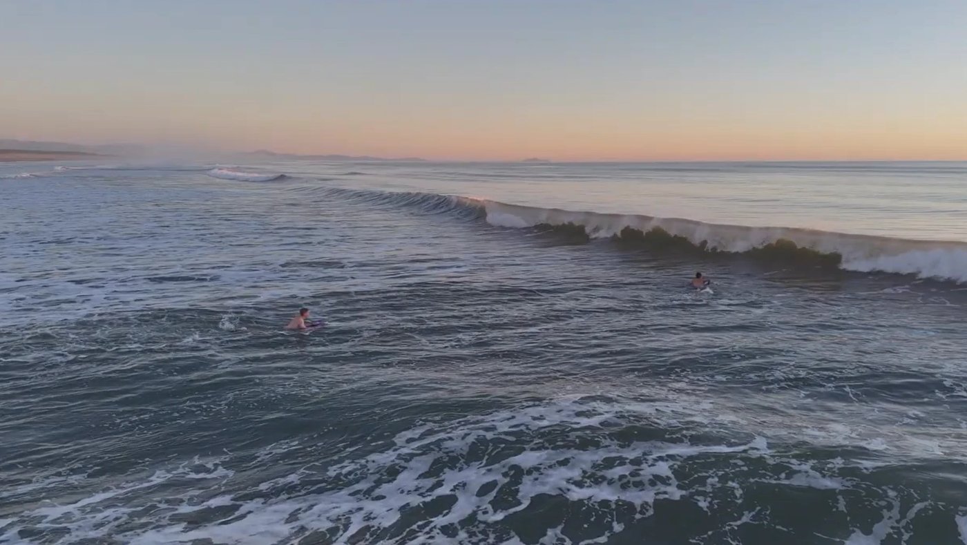 Surfing at Himatangi, Himatangi surf spot, Manawatu / Whanganui, New Zealand.