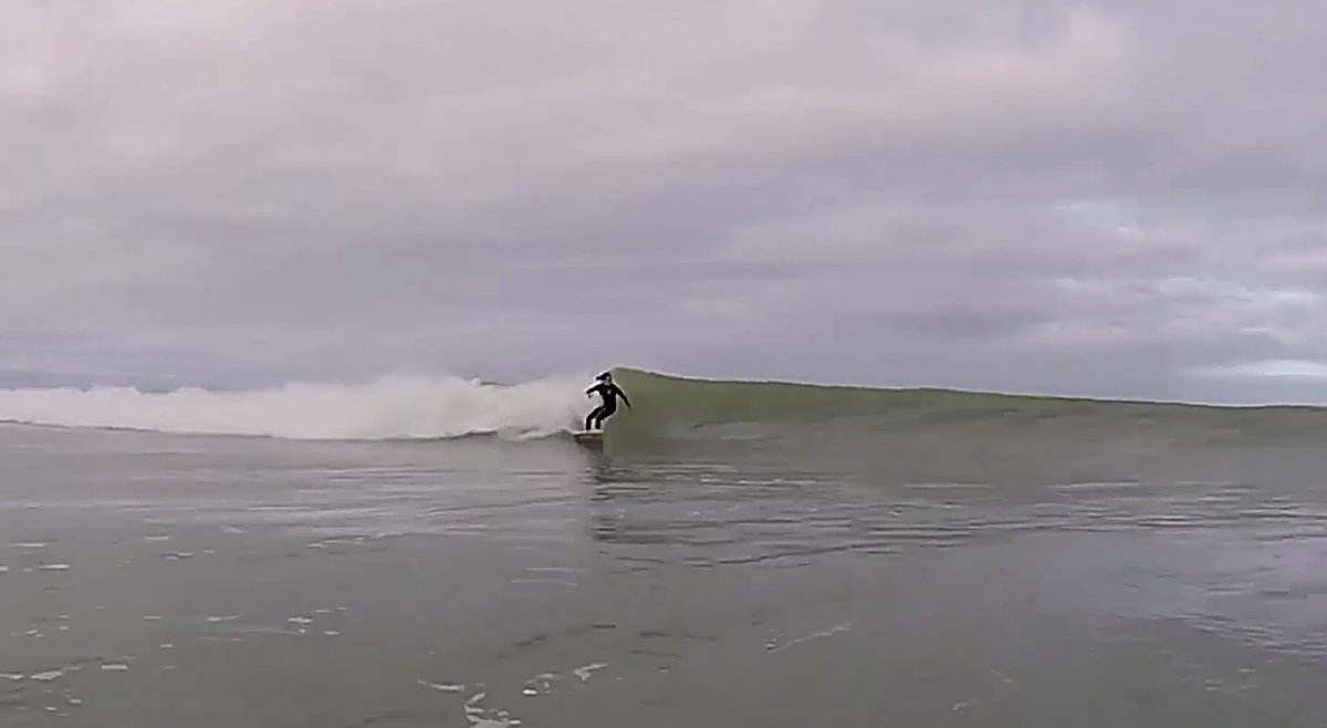 Gliding along a soft grey wall, the mellow end of what Karitane offers, Karitane Beach surf spot, Dunedin / Otago, New Zealan