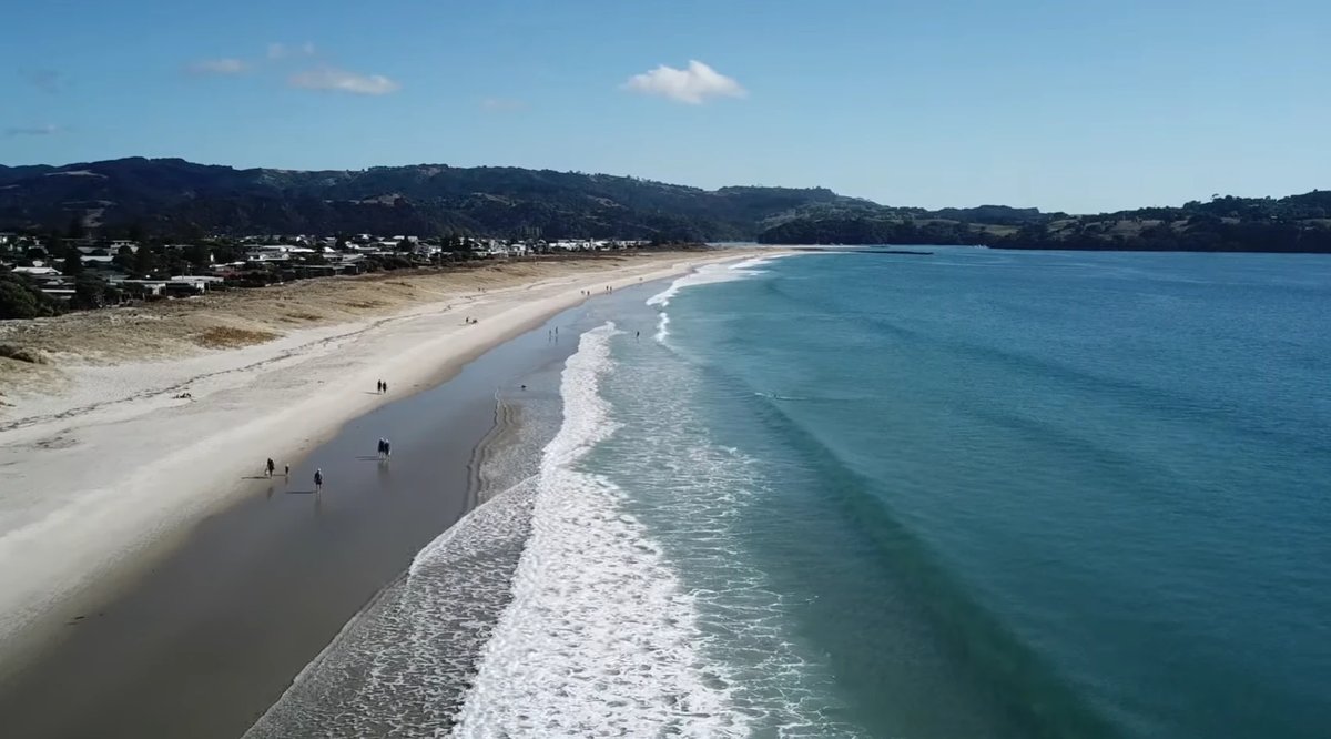 A quiet weekday on the main beach, Omaha surf spot, Auckland / Rodney, New Zealand.