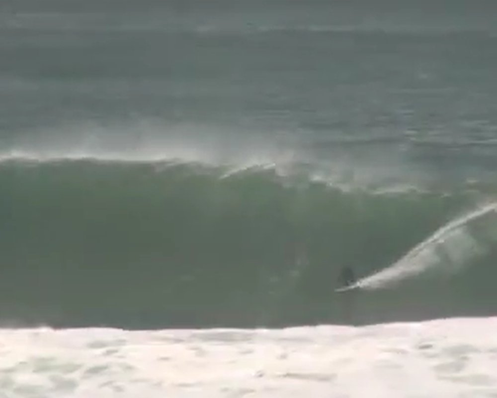 Another heavy wall stands tall, the kind of swell that draws the big-wave crew south, Papatowai surf spot, Catlins / South Ot