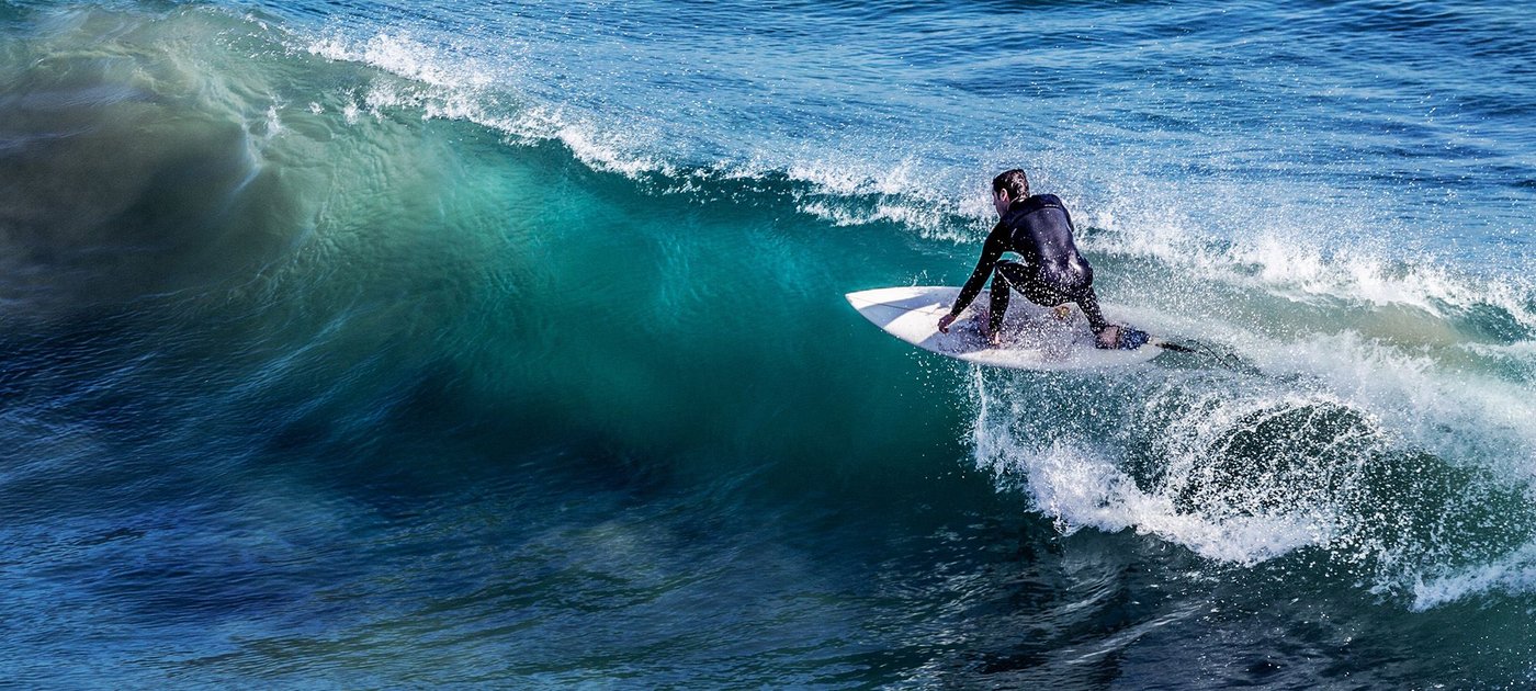 The peaks turn powerful and hollow on a solid groundswell, Sandy Bay surf spot, Northland East, New Zealand.