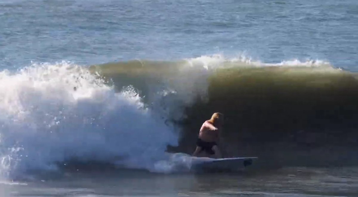 Tucked into a Stent Road barrel, Stent Rd surf spot, Taranaki / SH45, New Zealand.