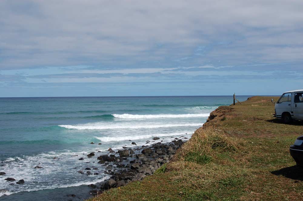 Checking the lineup from the clifftop at Stent Road, Stent Rd surf spot, Taranaki / SH45, New Zealand.