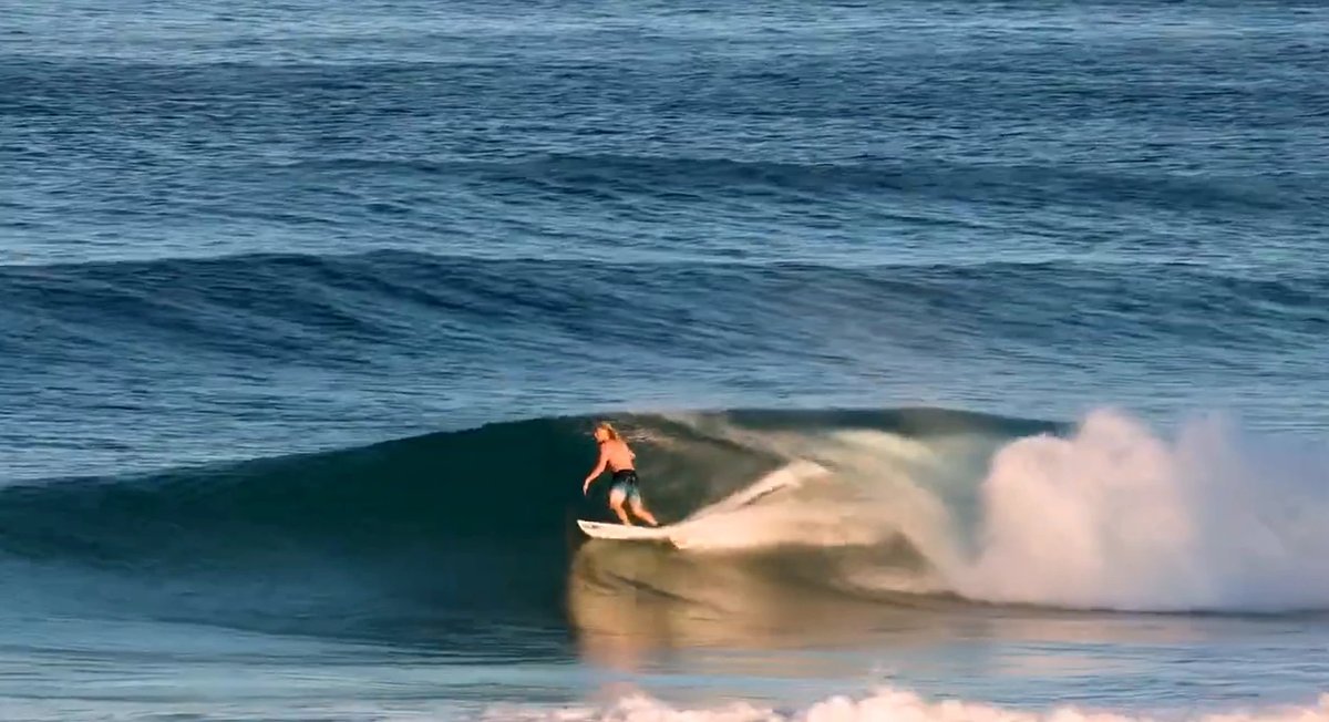 Solo barrel on a working day, Tairua surf spot, Coromandel, New Zealand.