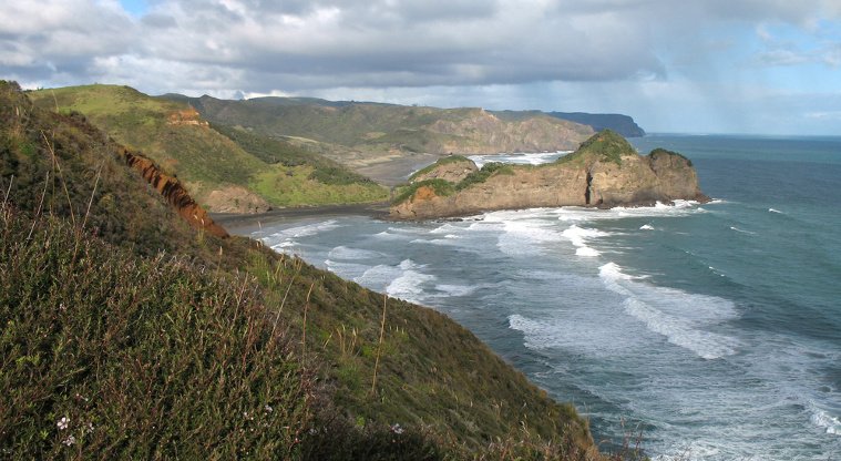 The south end of the bay from the cliffs above. The headland here separates Bethells from the Erangi Point cliffs, Te Henga /
