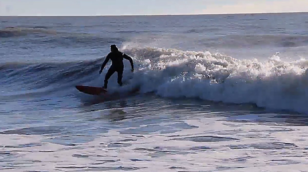 Skimming across a backlit wall on a bright Marlborough morning, The Cut (Blenheim) surf spot, Marlborough / Nelson, New Zeala
